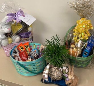 Easter packages arranged on a cupboard or shelf.